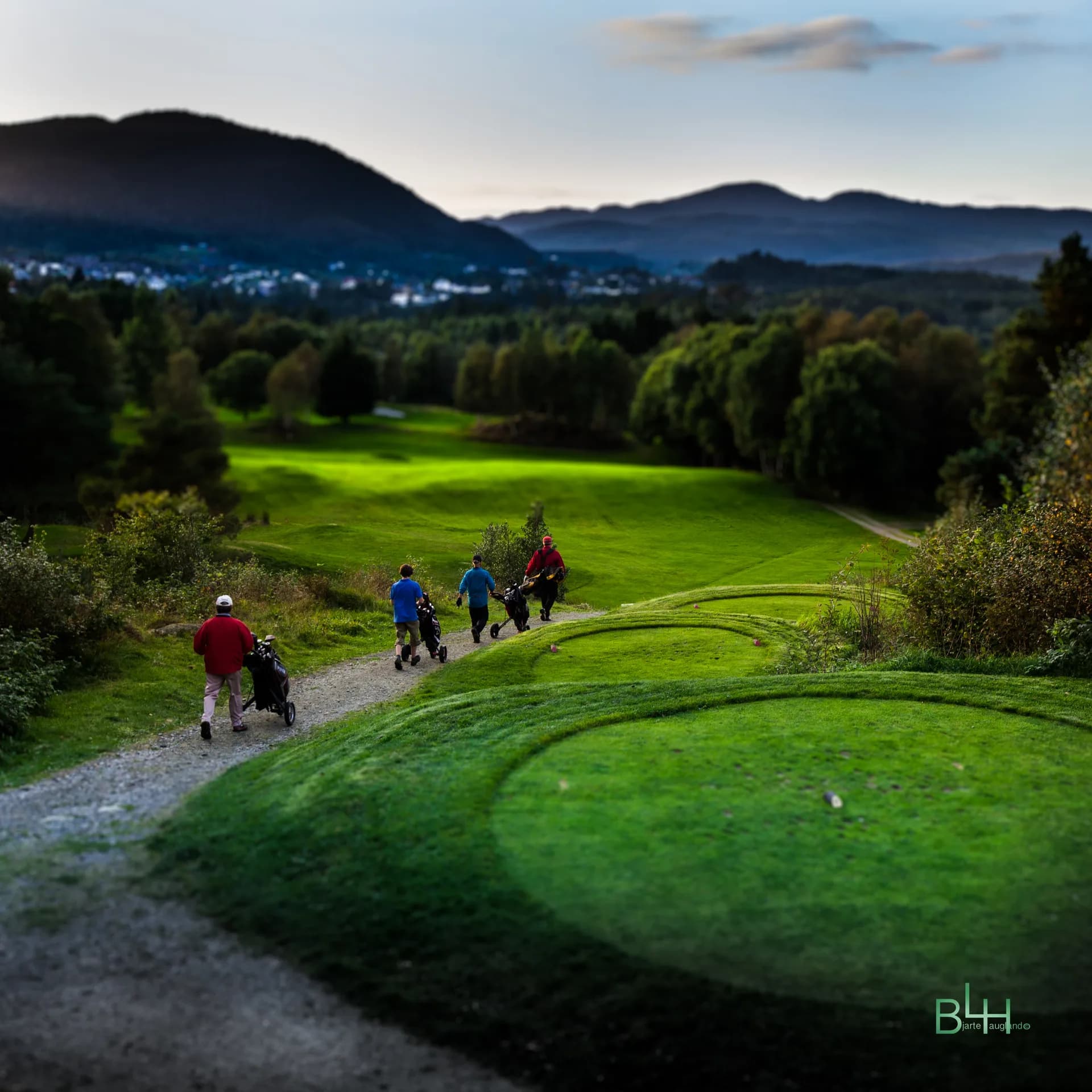 Golf course at Bjørnefjorden Golf Club centrally located by Os town center with bunkers and green fairways