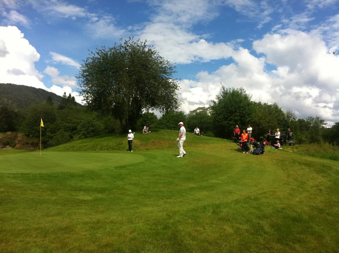 Bjørnefjorden Golf Club's 9-hole park and forest course with tee boxes and fjord view