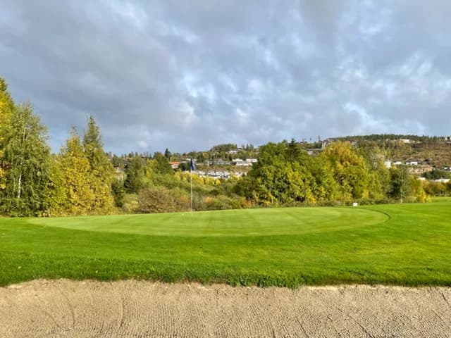 Fairway on hole 4 at Fet Golf Club with lush green surroundings