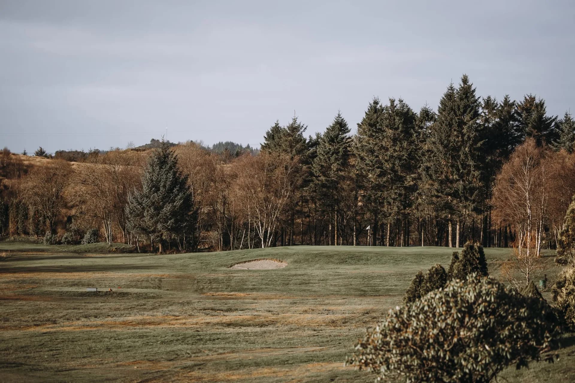 Overview of the golf course at Haugesund Golf Club with fairways and natural terrain