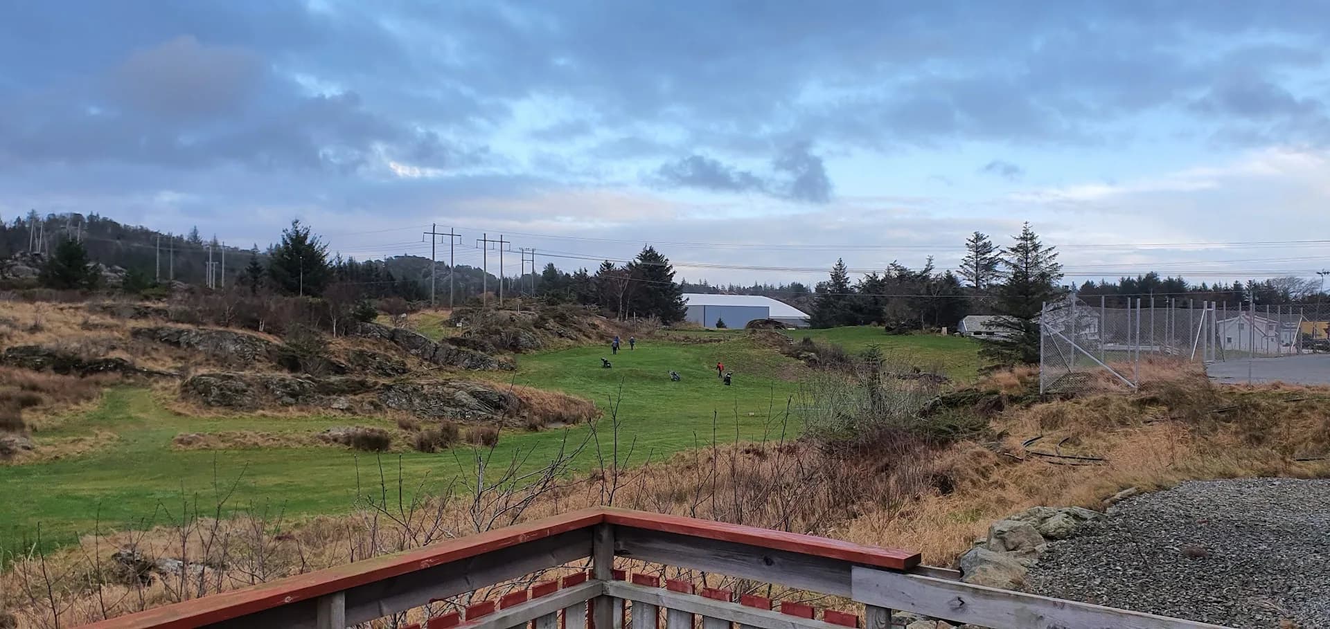 Winter view over Karmøy Golf Club with coastal nature and trees