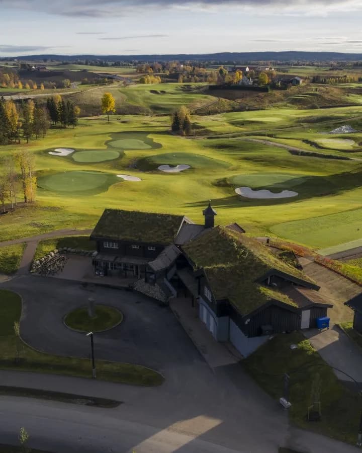 Clubhouse at Miklagard Golf with characteristic Norse architecture in Kløfta
