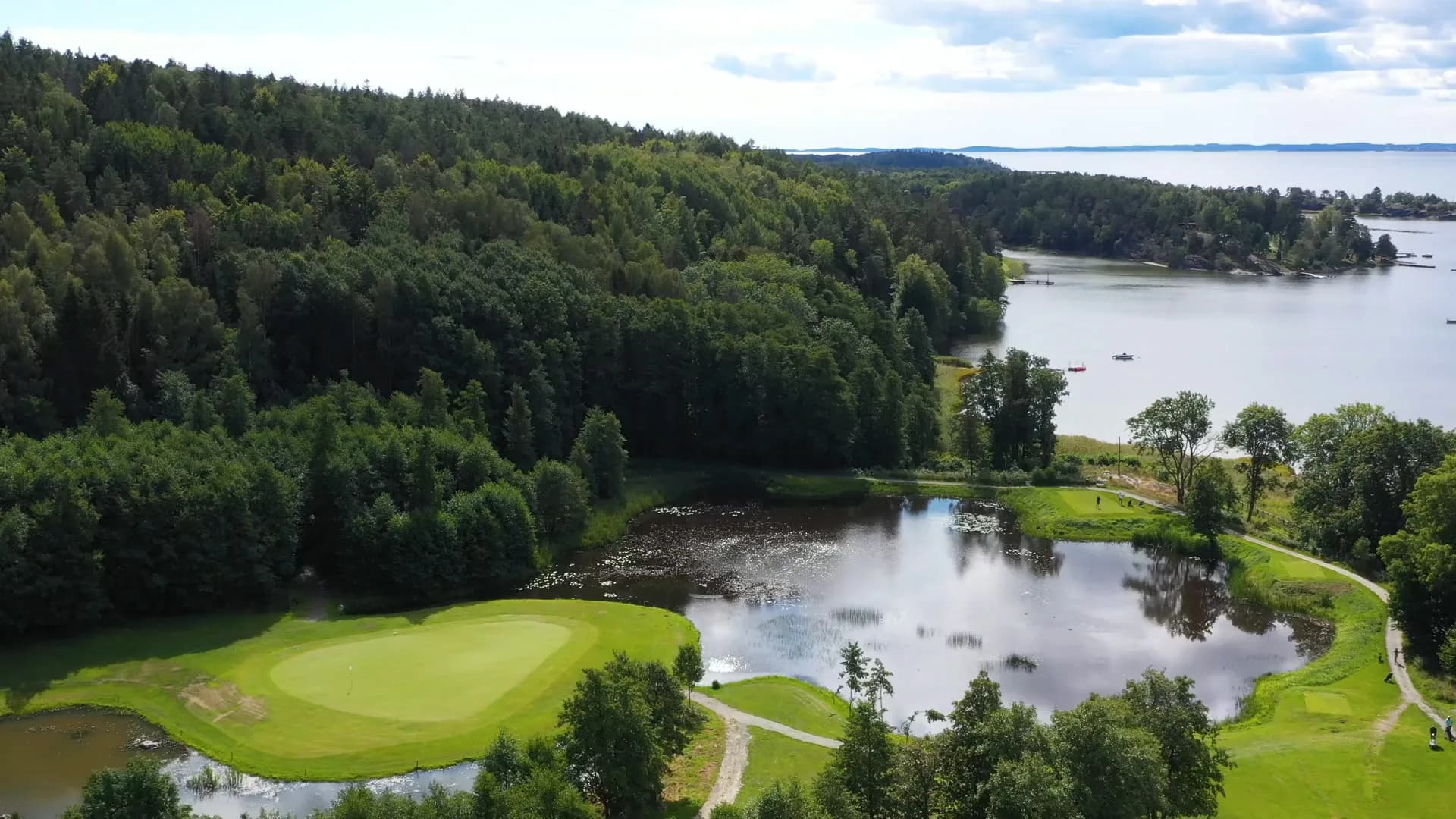 Overview of Evje Golf Park with golf course, fairway and view over the fjord near Moss