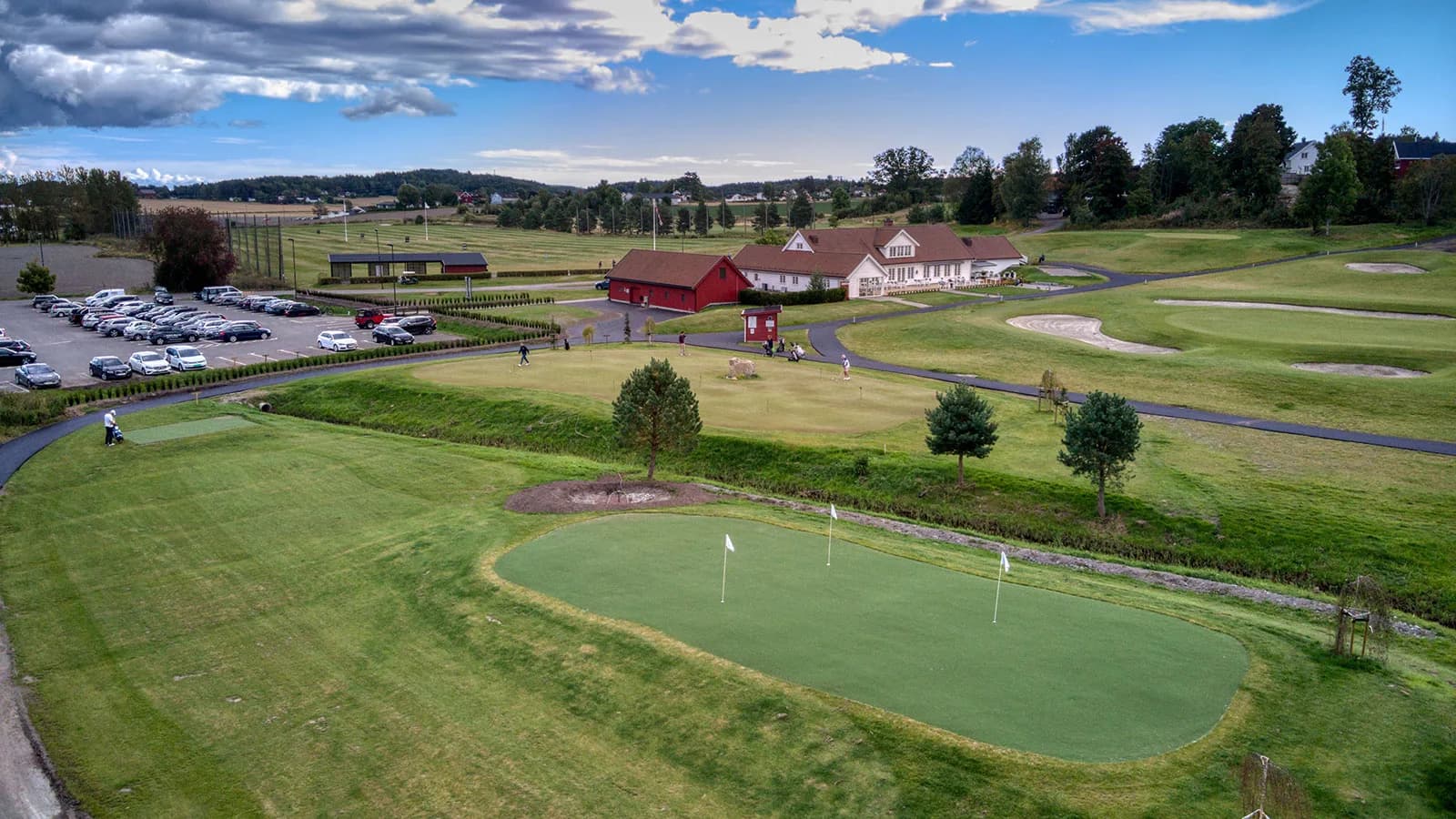 Chipping practice area at Nøtterøy Golf Club from above with practice greens