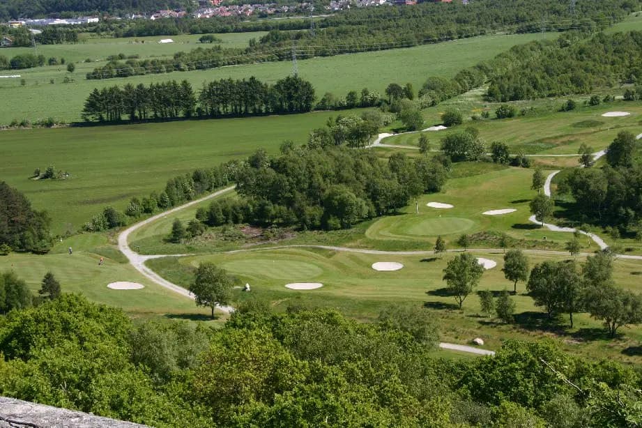 View from Baerheimsnuten over Sandnes Golf Club with bunkers, greens and the Jaeren landscape