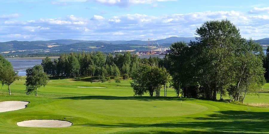 Hole 2 at Stiklestad Golf Club with fairway surrounded by forest at Trones in Verdal